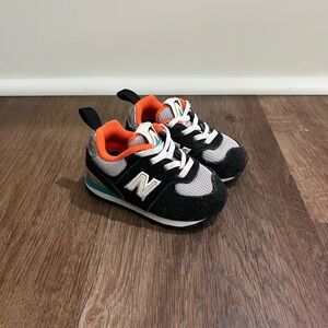New Balance Black White Orange Toddler Trainers